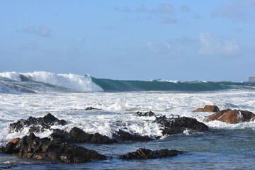The sea demonstrating its power against the cliffs