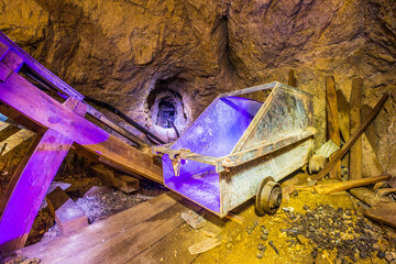 Ore cart  inside an old and abandoned gold mine in California. 