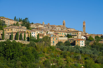Fototapeta na wymiar Landscape of the medieval town of Montalcino on a sunny September day. Italy