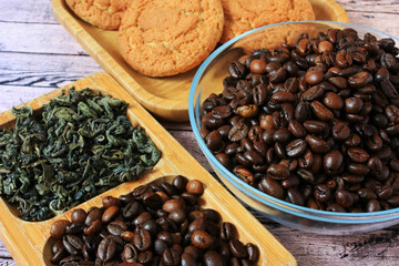 Brown coffee beans on a plate