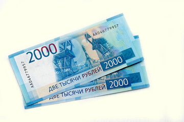 Scattered Russian 2000 rubles banknotes closeup