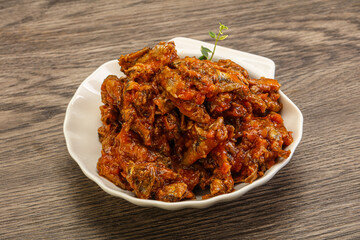 Canned anchovy in tomato sauce