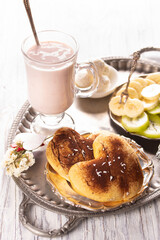 Fruity oghurt smoothie,bun and fresh fruit for breakfast