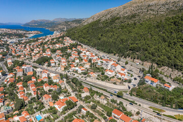 Aerial drone shot of high way from Old town Dubrovnik to Lapad Peninsula in Croatia summer noon