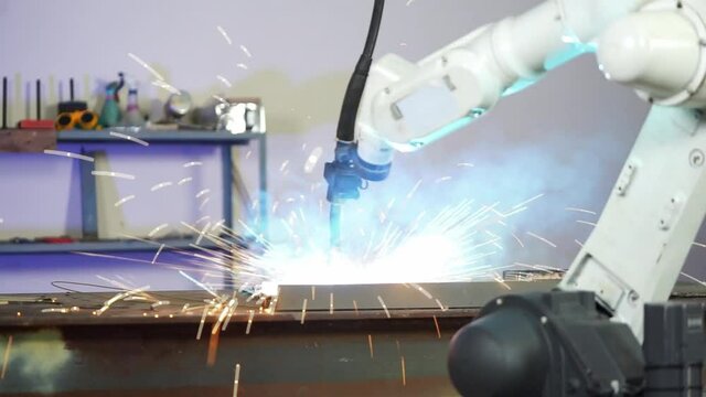 The robot does the welding in the factory