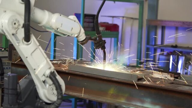 The robot does the welding in the factory