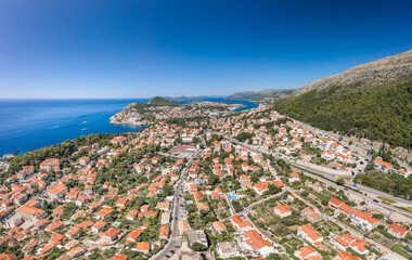 Aerial drone shot of Dubronik west new town near Lapad Peninsula in Croatia summer noon
