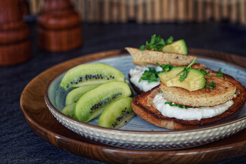 Eggs in a basket and kiwi