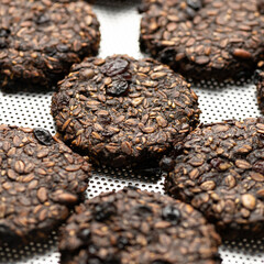 Oatmeal cookies with raisins and chocolate. Sweet pastries, dessert concept. Close up shot. Square format or 1x1. Delicious sweet Food background for posting on social media.