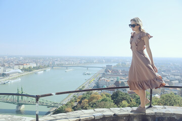 Budapest summer girl, panoramic view of the capital of Hungary, Danube bridge, Gelert hill