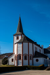 Fototapeta na wymiar The monastery church in Niederehe when the weather is nice