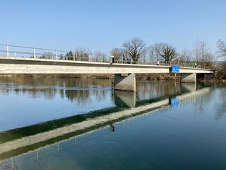 Concrete bridge over the river Reuss in the natural protection zone Aargau Reuss river plain...
