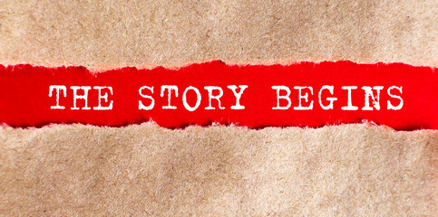 text THE STORY BEGINS appearing behind torn paper.Business