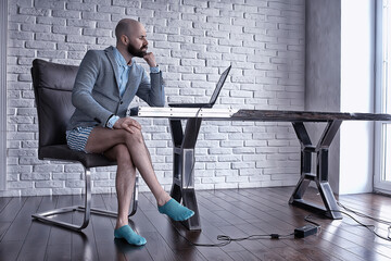 male remote work video conference from home in shorts and a jacket humor