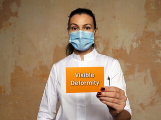 Medical concept meaning Visible Deformity with phrase on the page.