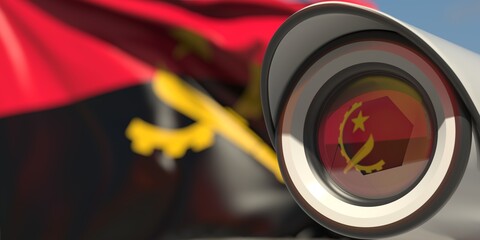 National flag of Angola and CCTV camera. Surveillance system conceptual 3D rendering