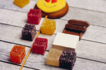 gingerbread in the form of a smiley on a stick marmalade sweets dessert