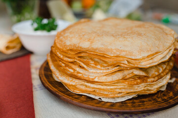 A stack of hot homemade pancakes for Maslenitsa
