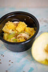 fruit salad on a light background. healthy food. diet food