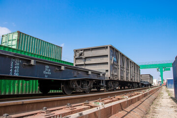 A container on the side of a railway track.