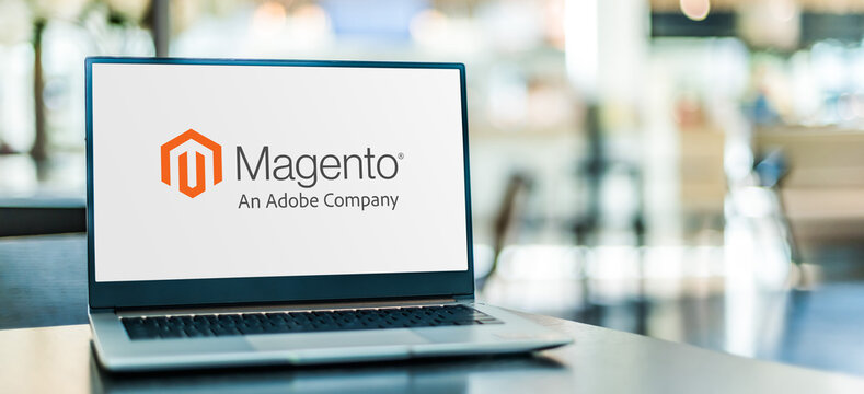Laptop computer displaying logo of Magento