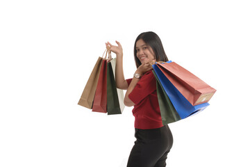 Young Asian women is shopping happily, on a white background.