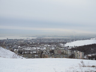 Fototapeta na wymiar Winter landscape. The nature of Saratov, Russia in winter. Winter road to the city