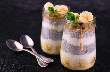 Healthy Dessert Chia Pudding Banana Jars Black Background Copy Space