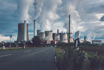 Fototapeta na wymiar street towards power plant in Niederaussem Germany, lignite-fired