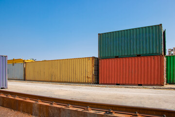 A container on the side of a railway track.