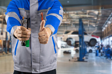 Auto mechanic in the auto service center car