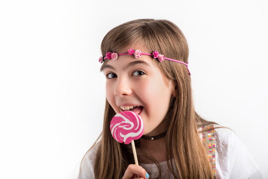 Young Woman Sucking Pink Lollipop