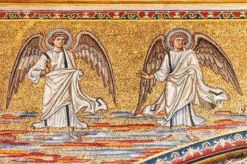 Obraz na płótnie Canvas Detail of religious golden mosaic showing angels on the wall of catholic church in Rome