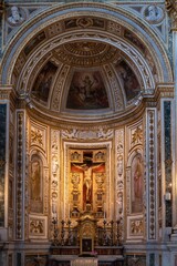 Fototapeta na wymiar Detail of altar of chapel inside catholic church in Rome