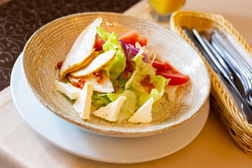 caesar salad with chicken and dehydrated sea buckthorn