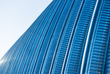 The surface of a industrial metal roof. Abstract background