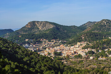 Fototapeta na wymiar Idyllic town in a green mountain landscape. Serra, Comunidad Valenciana, Spain