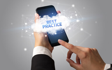 Female hand touching smartphone with BEST PRACTICE inscription, cloud business concept