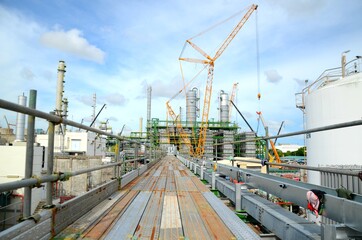 Scaffolding plate or scaffolding board that is installed on the high ground to support working at height of all worker during work in building construction site of petrochemical plant, oil and gas.