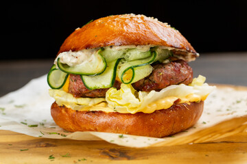 Perfect hamburger classic burger american cheeseburger with cheese, bacon, tomato and lettuce