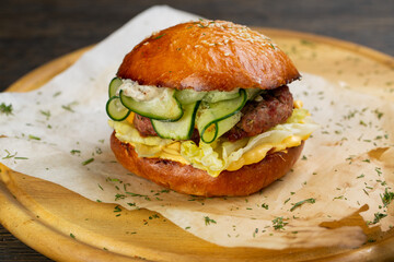 Perfect hamburger classic burger american cheeseburger with cheese, bacon, tomato and lettuce