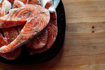 red fish on a plate steaks marinated in spices sea food