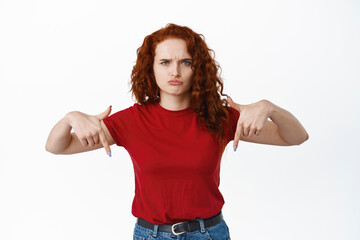 Image of disappointed and sad woman complain on unfair thing, sulking and frowning, pointing...