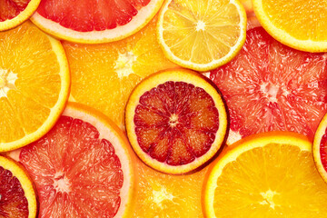 Background from citrus oranges, grapefruit, lemon close-up.