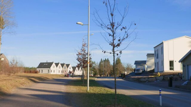 Beautiful landscape view of village spring landscape on blue sky background. Uppsala. Sweden.
