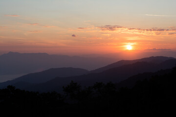 Beautiful sunset or sunrise sky on mountain hill. Background nature landscape view concept.