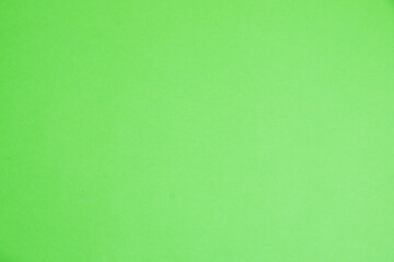 Background with copy space. Colored green paper or cardboard with space for text, horizontal format