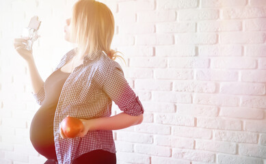 Pregnant young beautiful girl on the ninth month