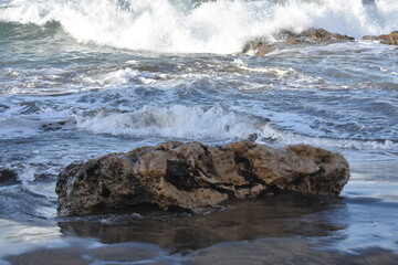 Watching the waves from the cliff