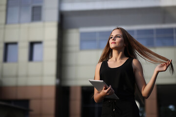 Fototapeta premium Girl with documents at a business meeting